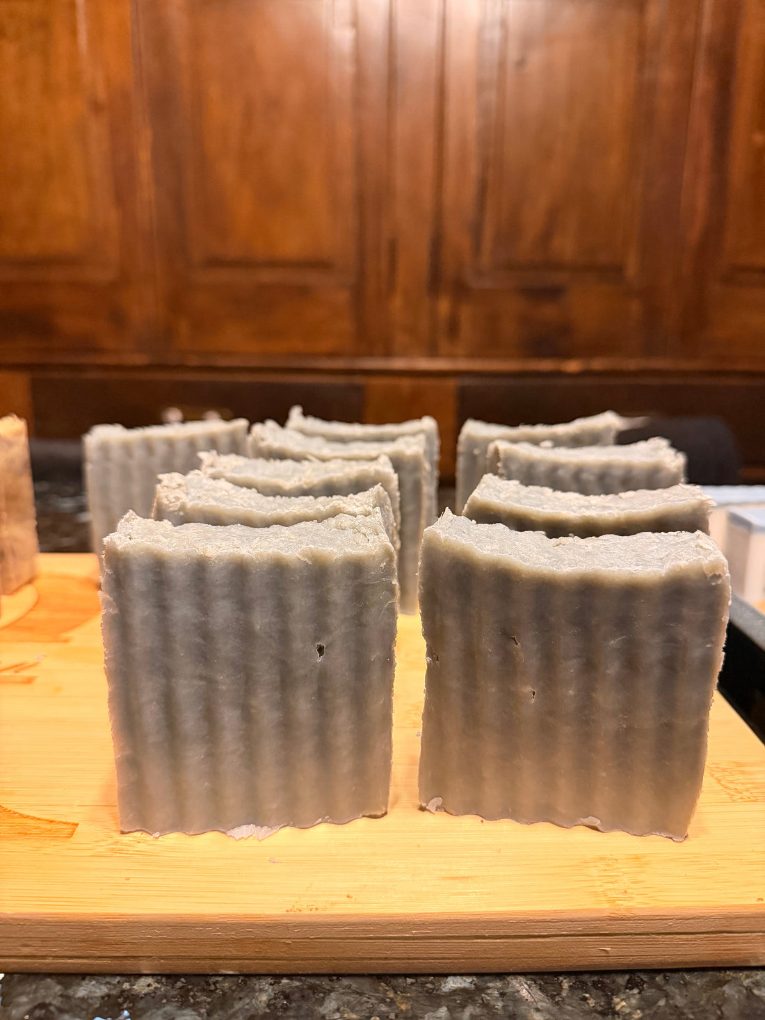 Activated Charcoal Skincare soap bar with citrus slices display